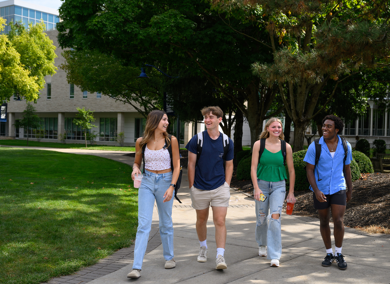 Students walking across the quad area.